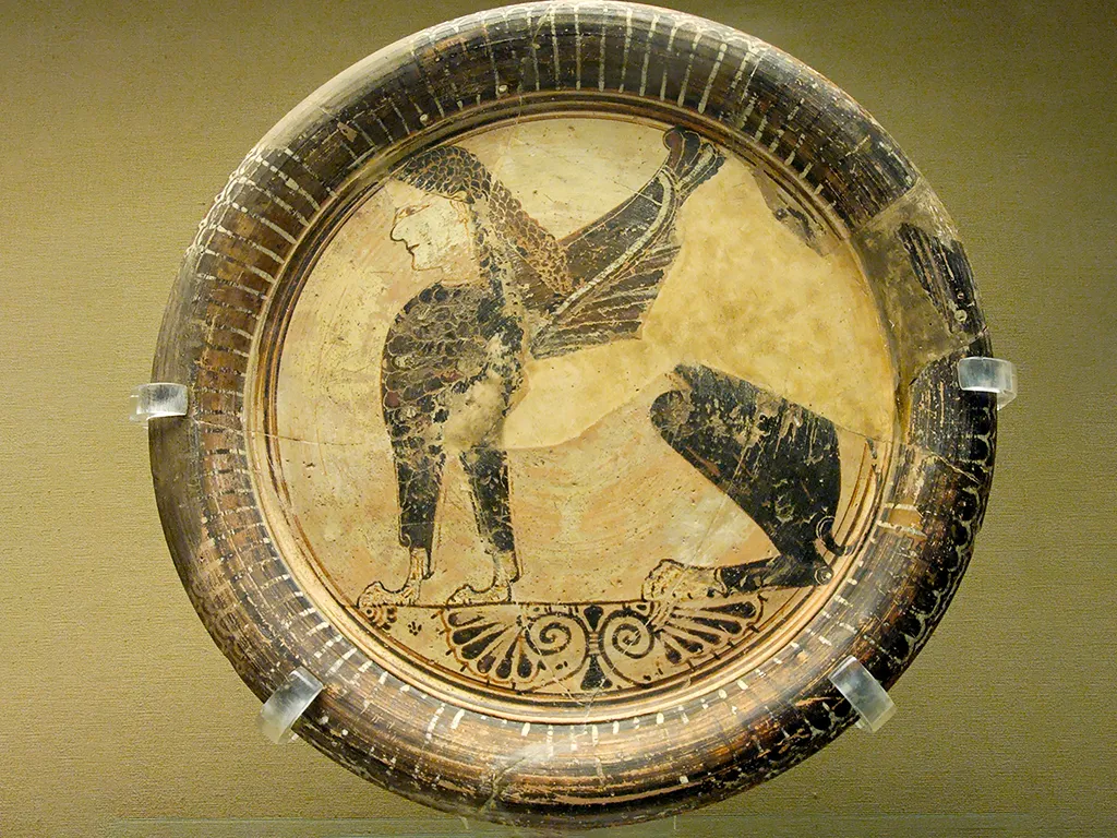 The Greek Emporion of Naukratis c 664 BC - c 700 AD - Seated sphinx plate, Eastern Greek Orientalizing, 6th century BC, from Naukratis